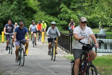 Cyclists on the Pogue's Run Trail